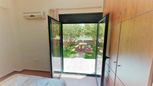 Postel nebo postele na pokoji v ubytování Villa Eleni
