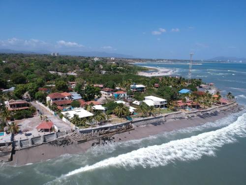 an aerial view of a resort on the beach at Apartamento El Palmar Residences in San Carlos