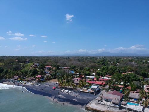 an aerial view of a resort on the beach at Apartamento El Palmar Residences in San Carlos