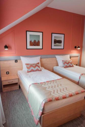 Katil atau katil-katil dalam bilik di Hotel Đakovo
