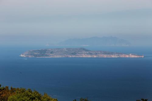 an island in the middle of a large body of water at Bella Vista b&b in Erice