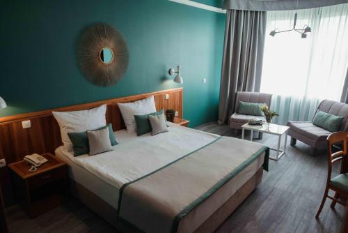 Katil atau katil-katil dalam bilik di Hotel Đakovo