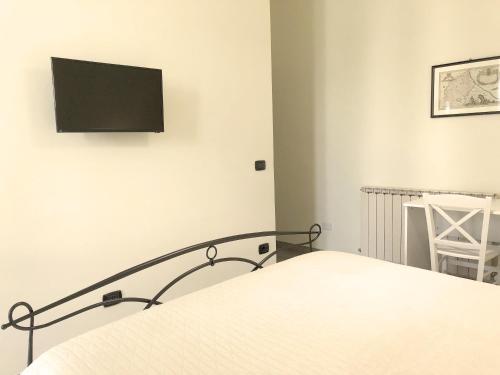 Una cama o camas en una habitación de C'era Un Lago