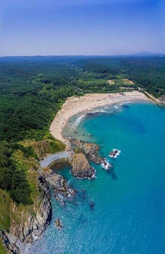 an aerial view of a beach with boats in the water at Sweet Suite Sinemorets in Sinemorets