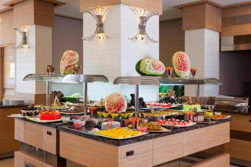 a buffet with many different types of food at Xperia Saray Beach Hotel in Alanya