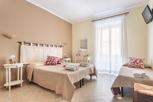 Postel nebo postele na pokoji v ubytování B&B Villamarì