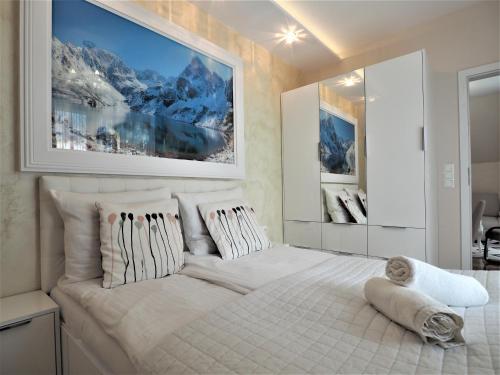 Posteľ alebo postele v izbe v ubytovaní VIP Apartamenty Cristal