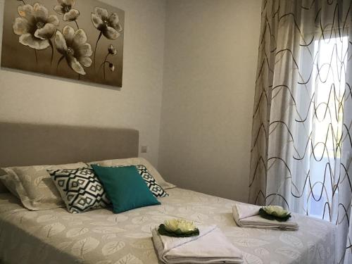 Кровать или кровати в номере George's Apartment - Zakynthos