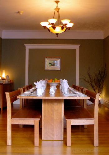 a dining room table with chairs and a dining room at The Inn on First in Napa