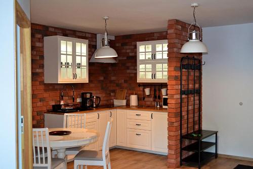 Η κουζίνα ή μικρή κουζίνα στο Apartament Uśmiech