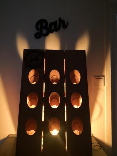 a bunch of lights in a box in a room at Groom Epernay - Jacuzzi & Champagne in Épernay