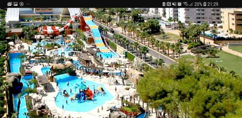 an image of a water park with a water slide at primera linea acapulco III in Oropesa del Mar
