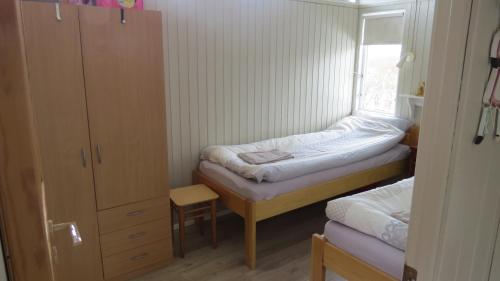 Postel nebo postele na pokoji v ubytování Hvammur 1 with private hot tub