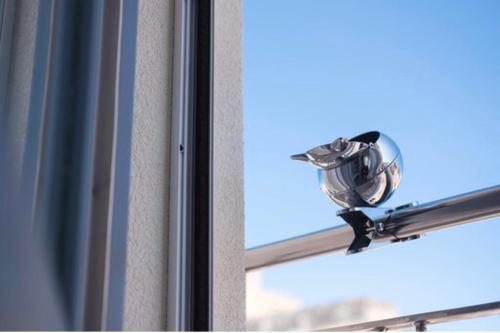 a security camera on the side of a window at Imera B&B in Favignana