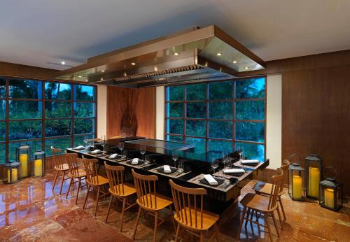 a large dining room with a long table and chairs at Meliá Punta Cana Beach Wellness Inclusive - Adults only in Punta Cana