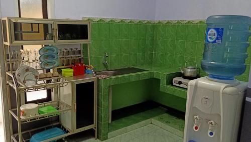 Kuchyň nebo kuchyňský kout v ubytování Holiday Home Anggun Bromo