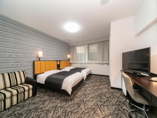 TV a/nebo společenská místnost v ubytování APA Hotel Himeji Ekikita