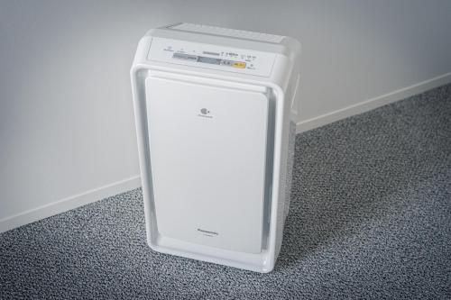 aintendo wii game system sitting on the floor at hotel androoms Nagoya Fushimi in Nagoya