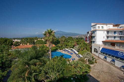 an aerial view of a resort with a swimming pool at Sant Alphio Garden Hotel & SPA in Giardini Naxos
