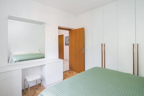 Un pat sau paturi într-o cameră la Mia resort