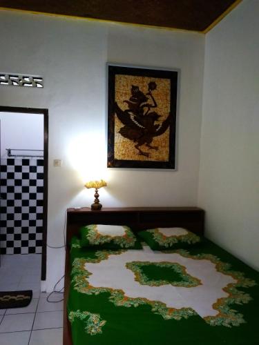 Кровать или кровати в номере Lia Homestay