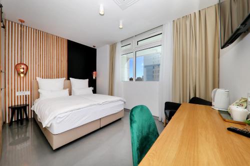Postel nebo postele na pokoji v ubytování White Rooms Zadar345