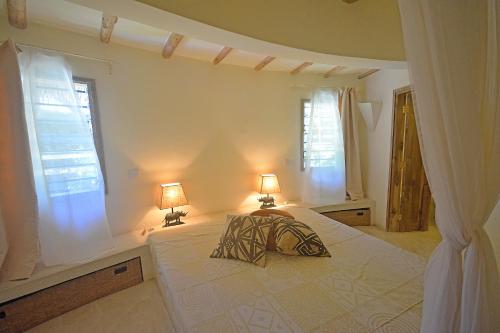 Ein Bett oder Betten in einem Zimmer der Unterkunft The Lawford Hotel