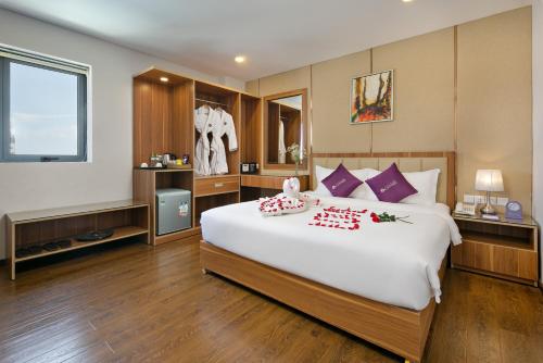 Ένα ή περισσότερα κρεβάτια σε δωμάτιο στο Lavender Riverside Hotel
