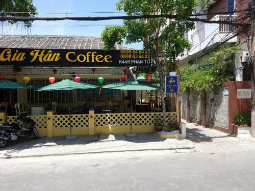 a restaurant with a sign that reads caffeham coffee at Starfish Alley Hostel in Danang