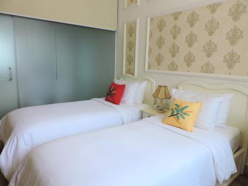 Cama o camas de una habitación en Chez Lotus