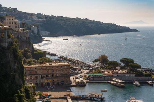 a view of a harbor with boats in the water at Le Muse Suite in Sorrento