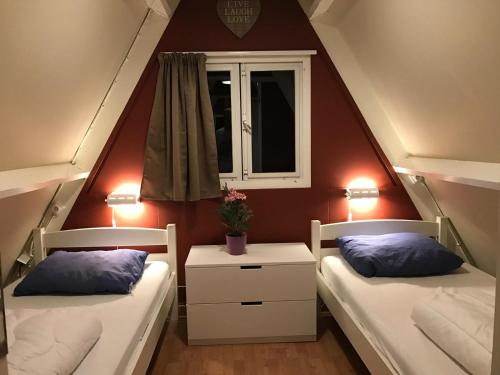 Ένα ή περισσότερα κρεβάτια σε δωμάτιο στο Bungalow Durbuy