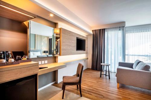 TV a/nebo společenská místnost v ubytování Hotel Amber Pattaya