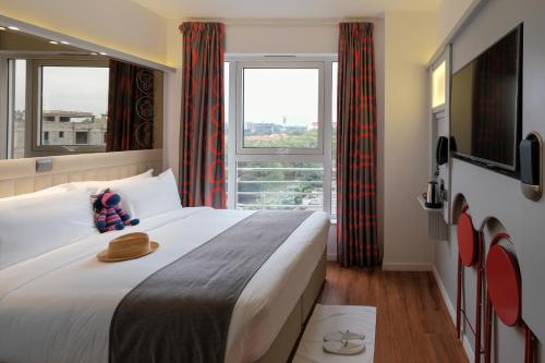 Cama o camas de una habitación en ibis Styles - Nairobi, Westlands