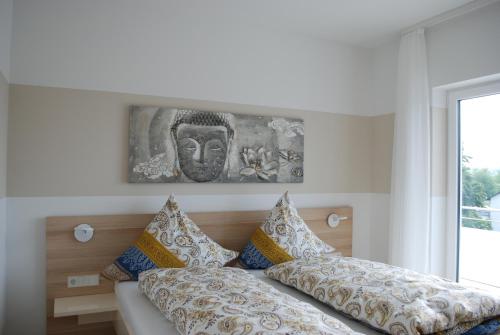 Giường trong phòng chung tại Starenweg Appartements