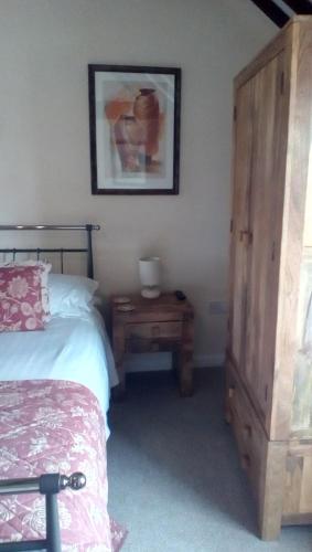Postel nebo postele na pokoji v ubytování The Lincolnshire Poacher Inn