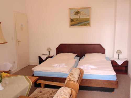 Postel nebo postele na pokoji v ubytování Hotel Richthofen