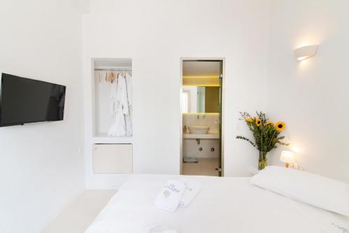 Cama o camas de una habitación en Vincenzo Family Rooms