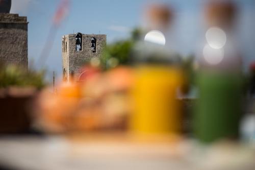 a blurry picture of a tower in a room at Bella Vista b&b in Erice