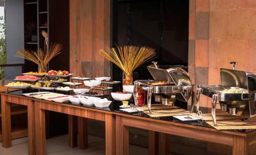 a buffet line with food on a table at Bass Boutique Hotel in Yerevan