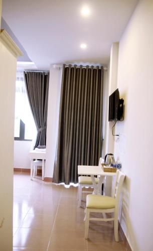 TV a/nebo společenská místnost v ubytování Grey House