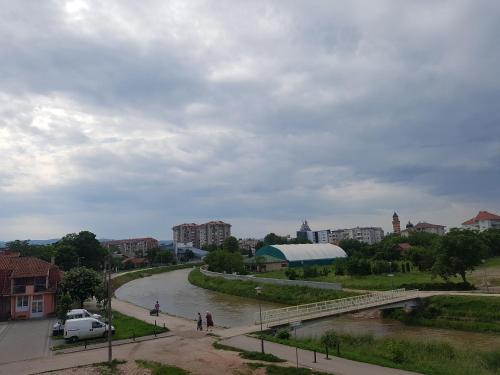a river in the middle of a city at BEST Apartments in Paraćin