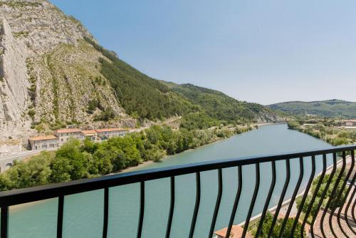 a view of a river from a balcony at Hôtel de la Citadelle in Sisteron