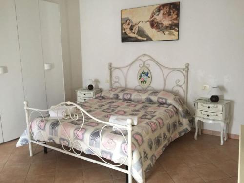 Cama o camas de una habitación en Appartamenti Il Criollo