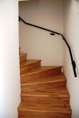 a set of stairs with a black light on the wall at Casale la Torretta in Norcia