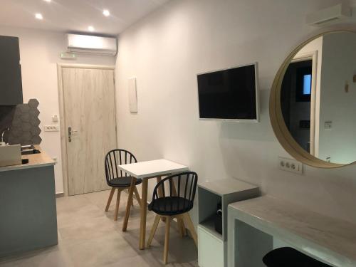 Una televisión o centro de entretenimiento en Dragonfly Villas