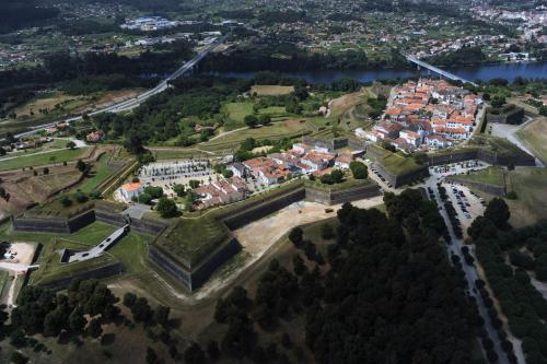 an aerial view of a city with a river at Hostel Bulwark in Valença