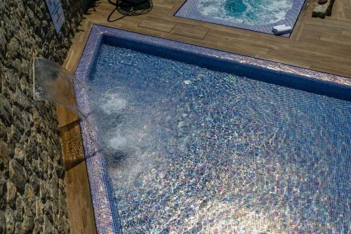 a swimming pool with a pool at Villa Palma Krk in Krk