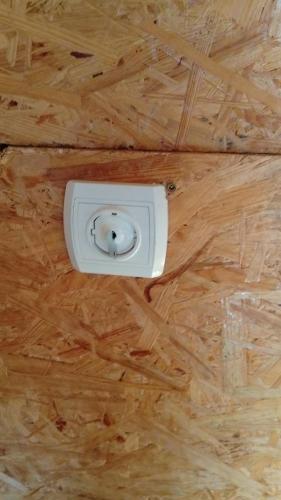 a white object on the ceiling of a room at Kuća Dragović Apartman in Kolašin