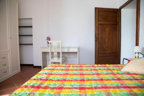 Postel nebo postele na pokoji v ubytování Appartamento Napoleone - HelloElba
